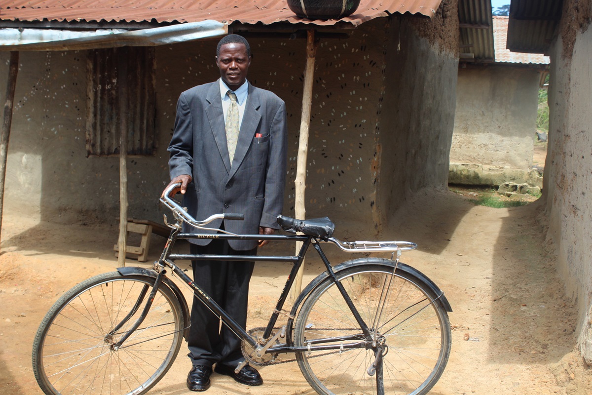 Pastor James Yarkpawolo said his pastoral ministry at Telemu United Methodist Church in Liberia has greatly improved since he received a bicycle as part of The United Methodist Church’s Bikes and Bibles ministry. Photo be E Julu Swen, UMNS.