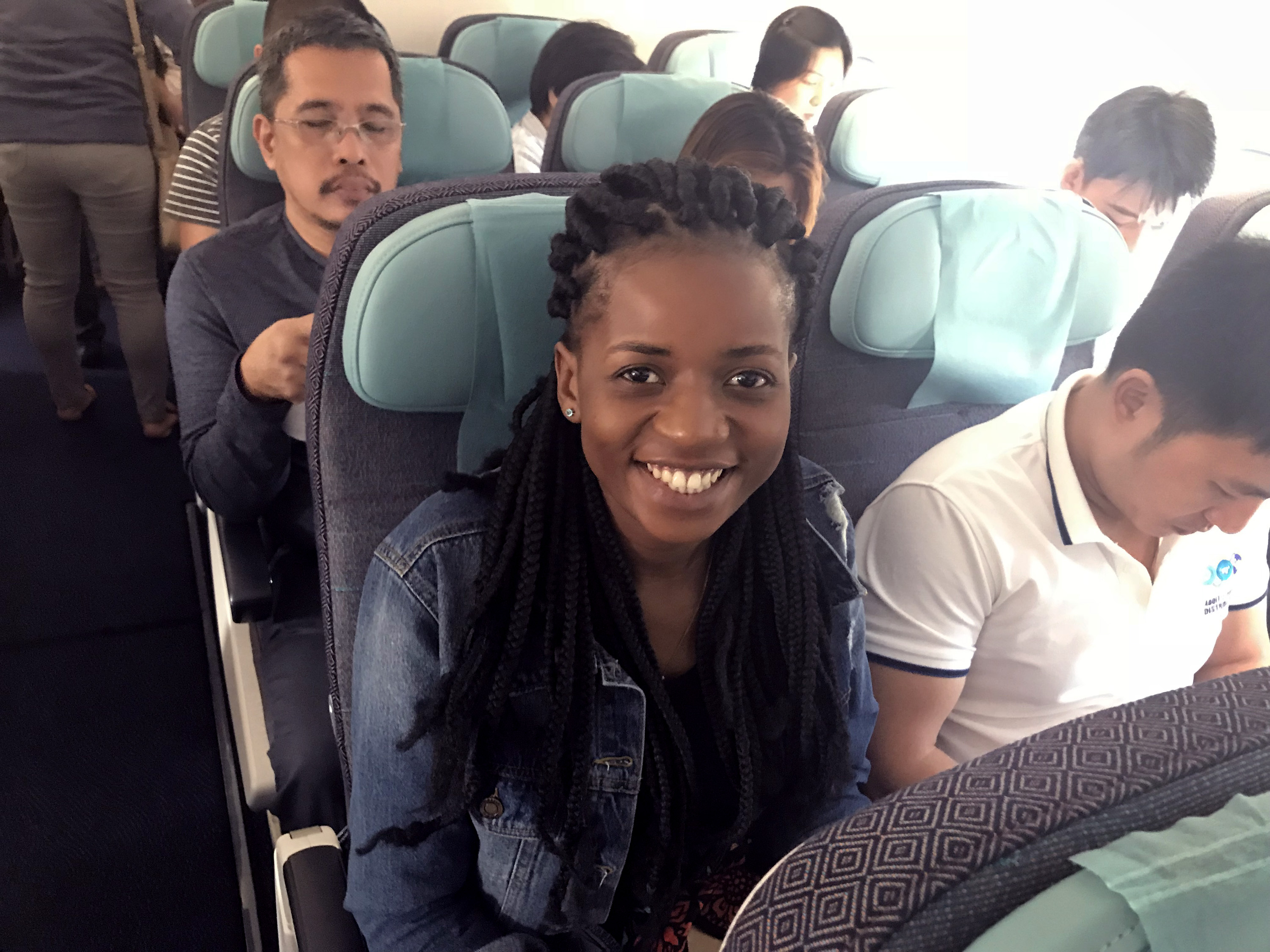 Miracle Osman smiles as she waits for her flight to depart from Davao to Manila. Osman is working with Filipino attorneys on paperwork to allow her to leave the Philippines. Photo courtesy of Thomas Kemper, GBGM.