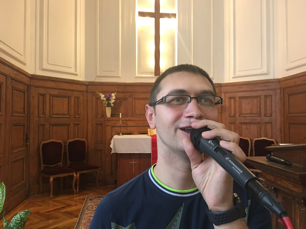 Presian Vlaiakov sings at the Sofia (Bulgaria) United Methodist Church. Vlaiakov, the son of a single mother, said his commitment to the church grew out of the love and help the church showed him as a child. Photo by the Rev. Mihail Stefanov.