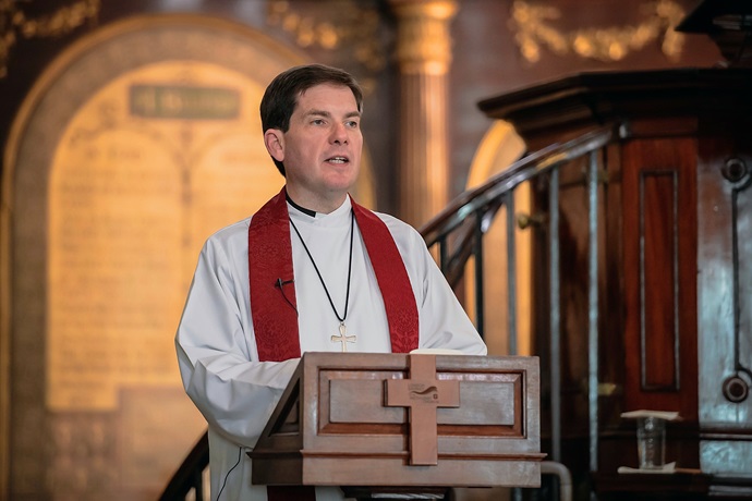 The Rev. Gareth Powell, secretary of the British Methodist Conference, presides over the opening worship service at Wesley’s Chapel as United Methodists and British Methodists celebrated a partnership of 50 years. Photo by Alex Baker.