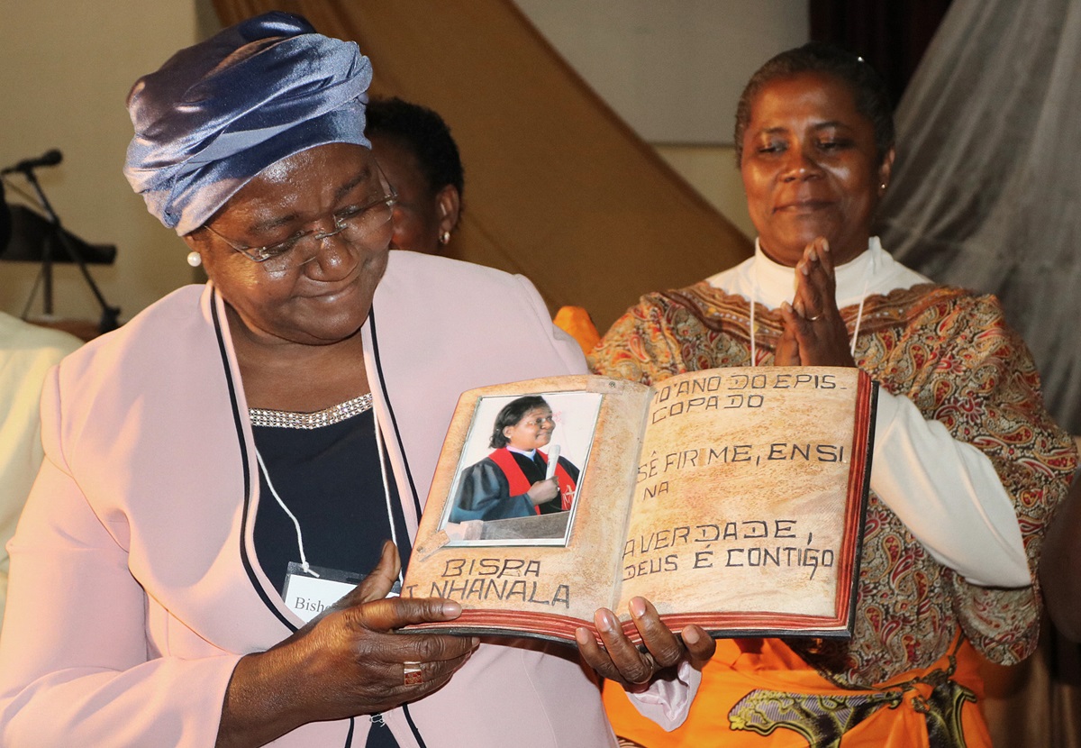Bishop Joaquina F. Nhanala of Mozambique is presented with a carving to commemorate her decade as the first and only female United Methodist bishop in Africa during a celebration at Africa University in Mutare, Zimbabwe. Photo by Eveline Chikwanah, UMNS.