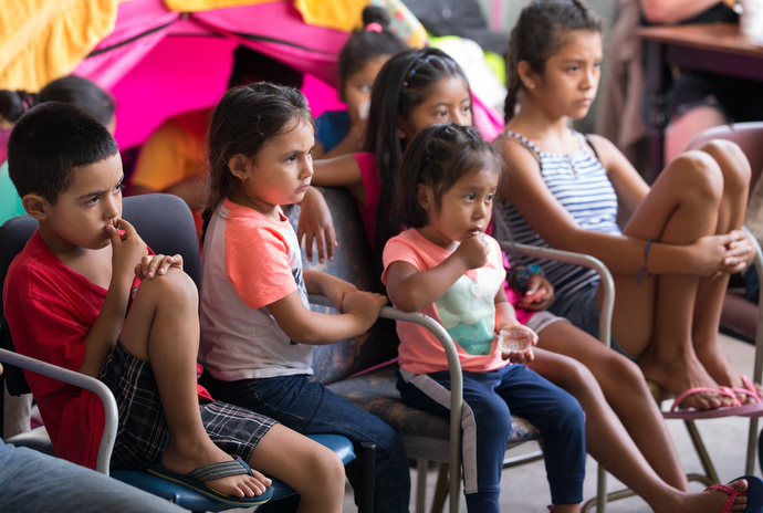 Children watch cartoons on television at the Movimiento Juventud 2000 shelter in Tijuana’s Zona Norte neighborhood. Photo by Mike DuBose, UMNS.