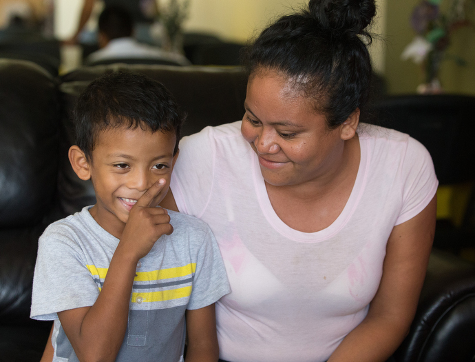 Jose Carlos Villegas and his mother, Jamie Silva Marcella, are staying at the "Door of Hope" Salvation Army shelter in Tijuana, Mexico. They were fleeing violence in their home state of Guerrero, Mexico. Photo by Mike DuBose, UMNS.