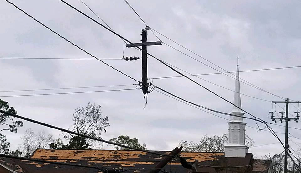 A utility pole destroyed by Hurricane Michael is left in the shape of a cross in front of Colquitt (Ga.) United Methodist Church. Photo courtesy of Colquitt United Methodist Church.