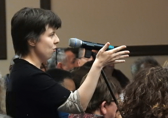 The Rev. Ruth Marston-Bihl takes her turn at the microphone during a discussion period at Do No Harm, The United Methodist Church's sexual ethics summit. The event drew about 280 people, including seven United Methodist bishops. Photo by Sam Hodges, UMNS.