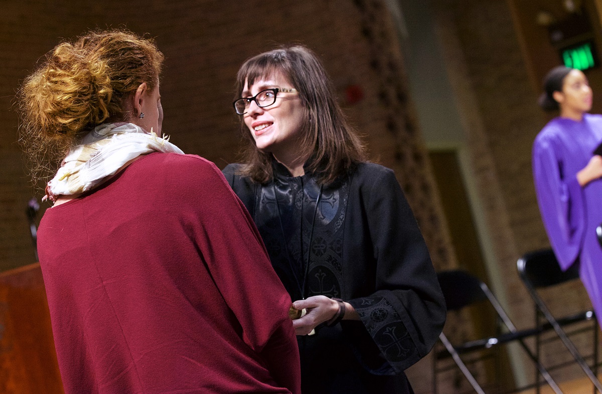 The Rev. Paige Swaim-Presley (center) imposes ashes on the forehead of a student at Millsaps College in Jackson, Miss., during Ash Wednesday services in 2018. A grant from the Lilly Endowment to the United Methodist-related college will help women clergy in the South with mentoring and networking. File photo courtesy of Millsaps College.