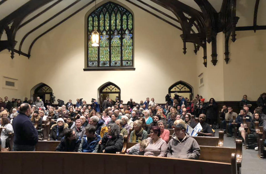 People gather for an interfaith prayer vigil at Sixth Presbyterian Church in Pittsburgh following a mass shooting at the city's Tree of Life synagogue. Photo by the Rev. Dawn Hand.