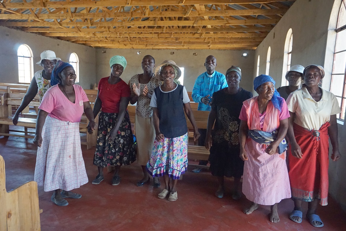Church members in the Shapure community of Nyanga, Zimbabwe, celebrate the new sanctuary donated to their community by United Methodists from Flekkefjord, Norway. Photo by Kudzai Chingwe, UMNS.