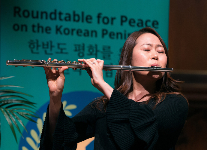 Yoonyung Seo plays the flute during closing worship at the Roundtable for Peace on the Korean Peninsula at Grace United Methodist Church in Atlanta. Photo by Mike DuBose, UMNS.