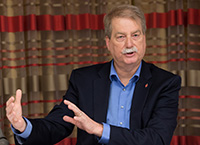 Bishop Kenneth H. Carter answers questions during a press conference about the United Methodist Church's Way Forward plan to address how the denomination ministers with LGBTQ individuals at the conclusion of the church's Council of Bishops meeting in Chicago in May 2018. File photo by Mike DuBose, UMNS.