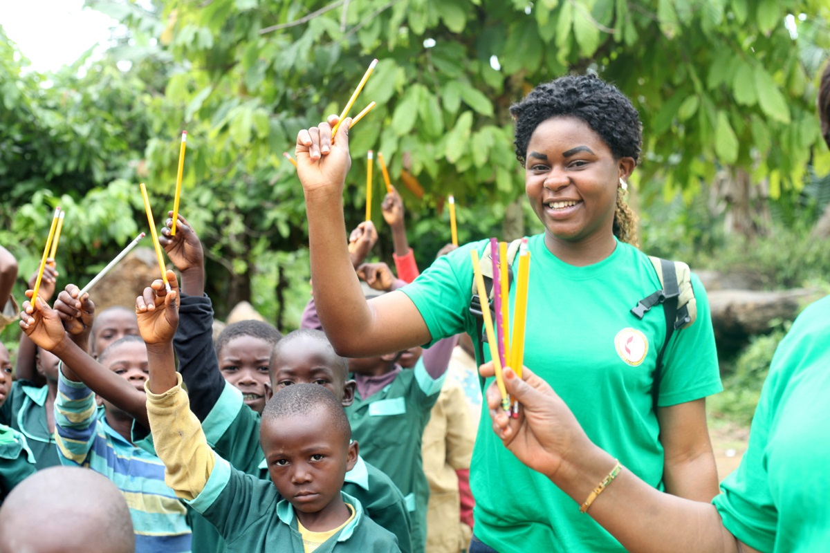 Agbor Bertile, a Global Mission Fellow in Cameroon, joined United Methodist Women for the distribution of pencils to students and teachers in rural Cameroon. Photo by Marius Bonfeu.