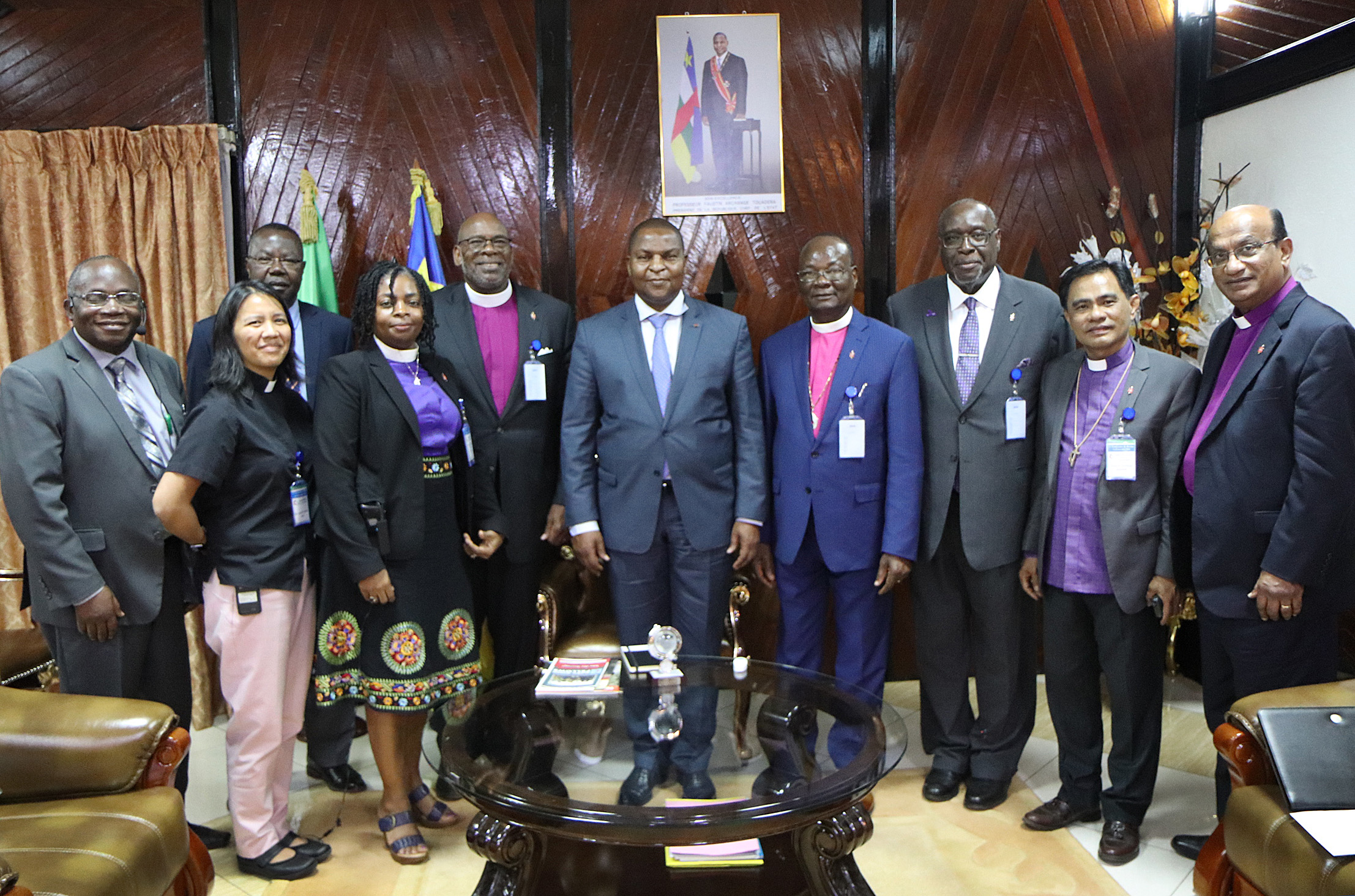 Members of The United Methodist Church Council of Bishops and Board of Global Ministries pose for a photo with Central Africa Republic President Faustin-Archange Touadéra in Bangui, Central Africa Republic. The delegation visited the country and Kenya Nov. 12-18. Photo by Isaac Broune, UMNS.