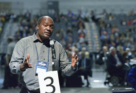 The Rev. Forbes Matonga, a clergy delegate from the United Methodist Church Zimbabwe Episcopal Area, speaks to the 2016 United Methodist General Conference in Portland, Ore., on May 11. Photo by Paul Jeffrey, UMNS.