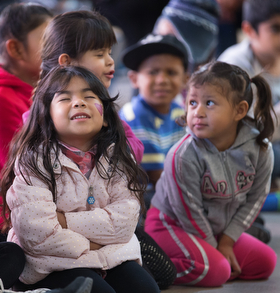 Children pray during a Christmas party at the Door of Hope Salvation Army shelter in Tijuana, Mexico. Migrant children who are staying with their mothers at the shelter joined with kids from the neighborhood and volunteers from the Methodist Church of Mexico in the celebration.