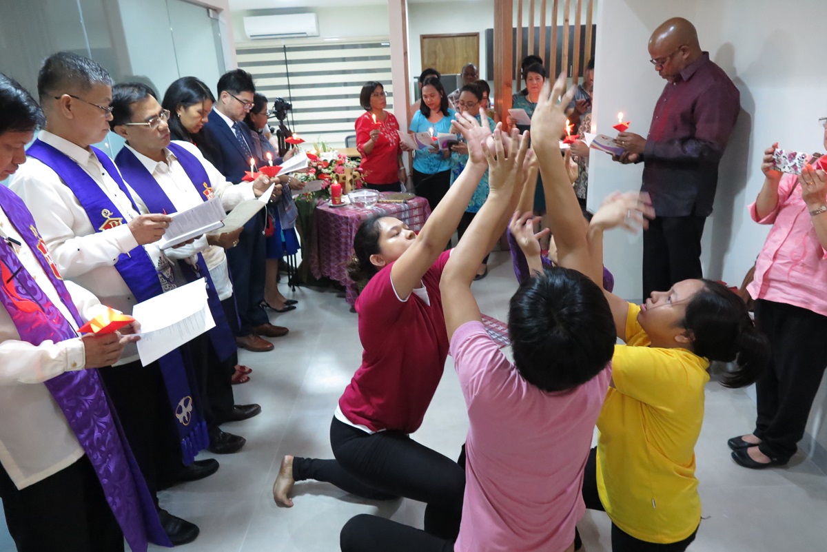 Liturgical dancers participate in the Dec. 18 dedication of the Manila Agency Center in the Philippines, along with area bishops (left) and other guests. Photo by Tim Tanton, UMNS. 