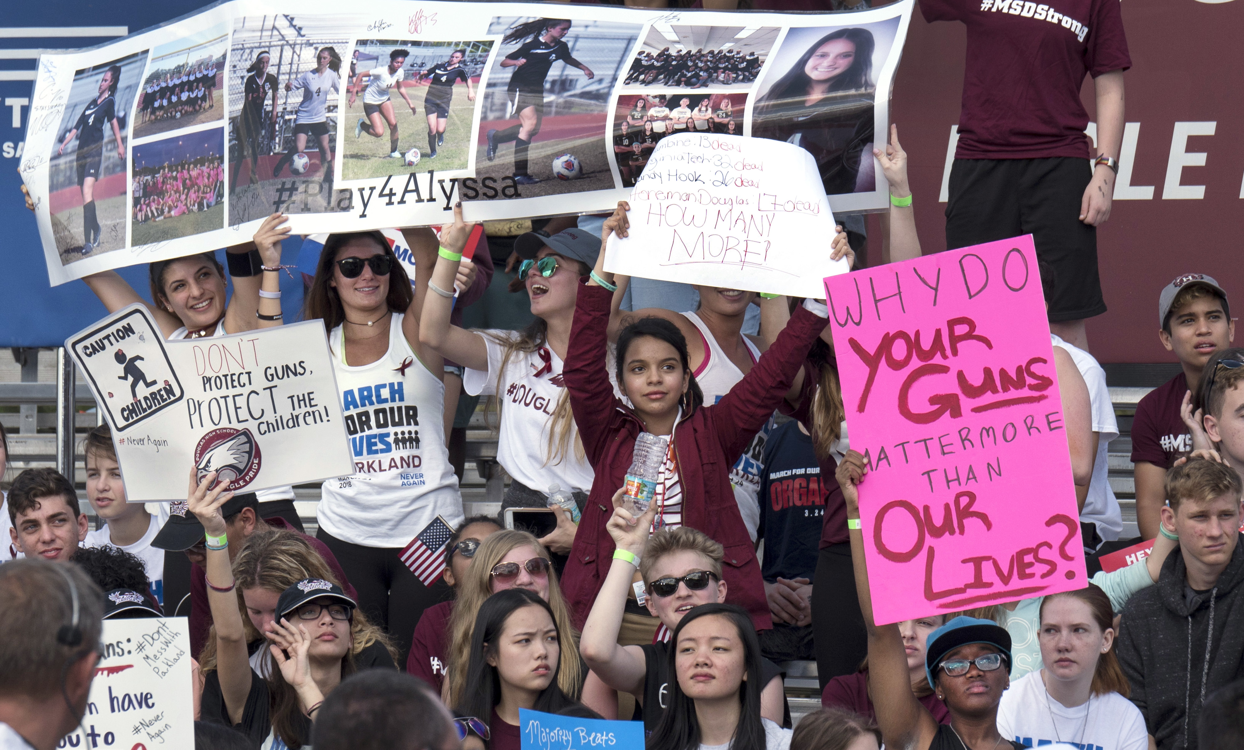 Students lined bleachers and held up handmade signs at a March for Our Lives rally in Parkland, Fla. The rally was held at a park one mile from Marjory Stoneman Douglas High School where 17 people were killed on Feb. 14. Students were calling for stricter gun laws and for greater voter turnout in elections. Photo by Kathy L. Gilbert, UMNS.