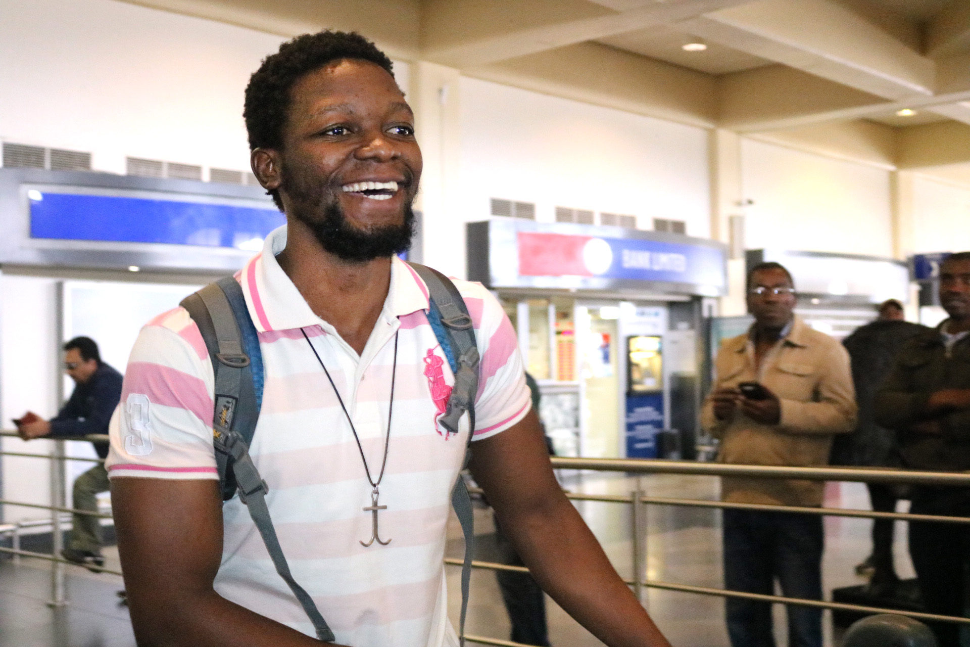 Tawanda Chandiwana exhibits a broad smile as he arrives back home in Zimbabwe in July, 2018, after a 56-day detention in the Philippines. The 13 agencies of The United Methodist Church are pursuing further accomplishments in 2019. File photo by Taurai Emmanuel Maforo, UMNS.