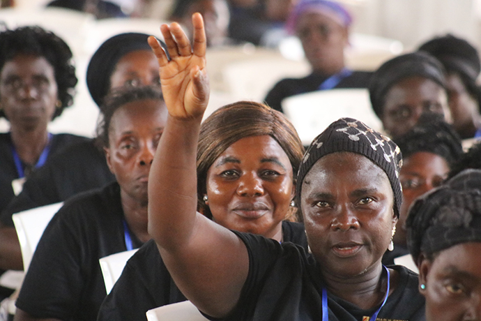 A participant asks a question about leadership roles for women during United Methodist Women’s 72nd annual gathering in Marshall, Liberia. Photo by E Julu Swen, UMNS. 