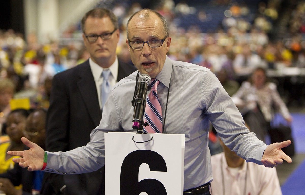 The Revs. Mike Slaughter (front) and Adam Hamilton speak in favor of legislation during the denomination's 2012 General Conference in Tampa, Fla. The two are part of Uniting Methodists, which is urging delegates at 2019 General Conference to delay until 2020 passing an exit plan for churches. Photo by Mike DuBose, UMNS. 