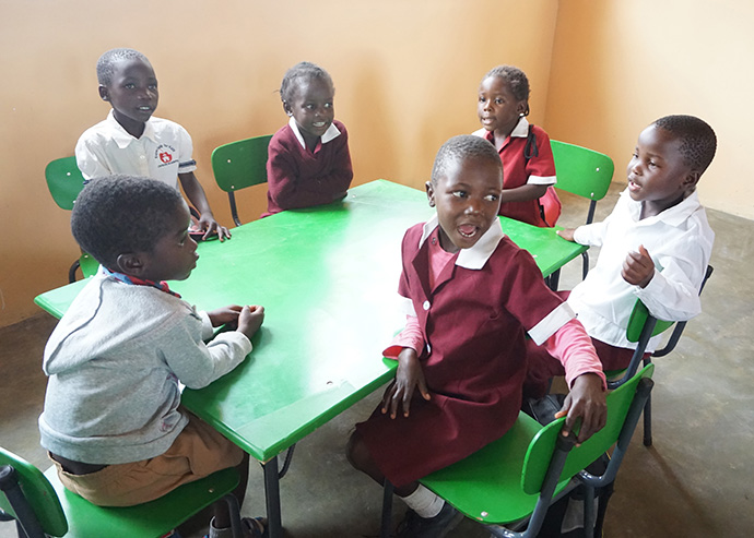 Students sit in a classroom at the new early childhood development center at Hanwa Mission School. Photo by Kudzai Chingwe, UMNS.