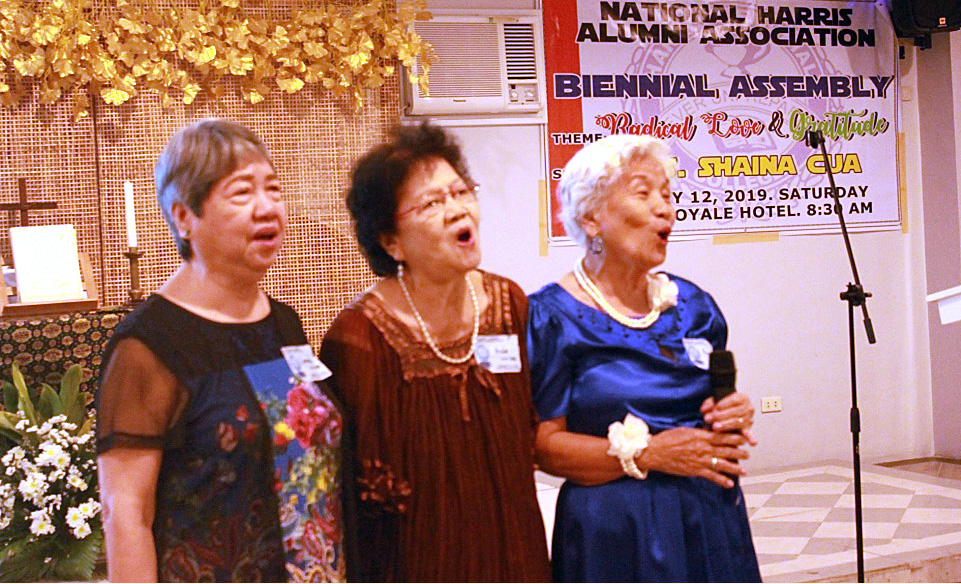 Zenaida P. Lumba (left), a 1959 graduate and former president of Harris Memorial College in Taytay, Philippines, stands with deaconesses Aluida Kasiguran (center) and Pag-asa Tecson-Lucas during the Harris alumni assembly. Photo by Gladys Mangiduyos, UMNS.