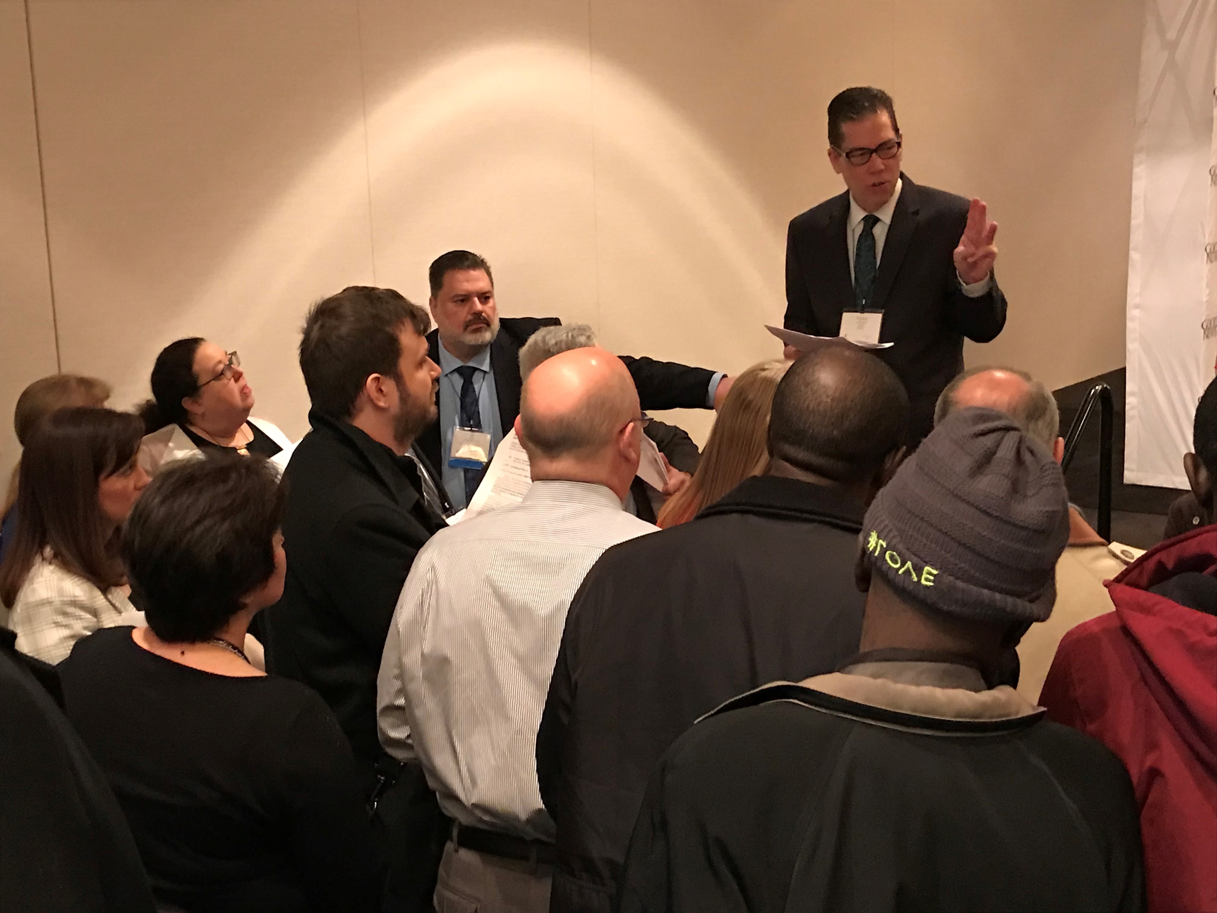 The Rev. Tom Lambrecht gives directions to General Conference 2019 delegates at the Feb. 25 breakfast briefing sponsored by Good News, the unofficial traditionalist advocacy group within The United Methodist Church. Photo by Sam Hodges, UMNS.