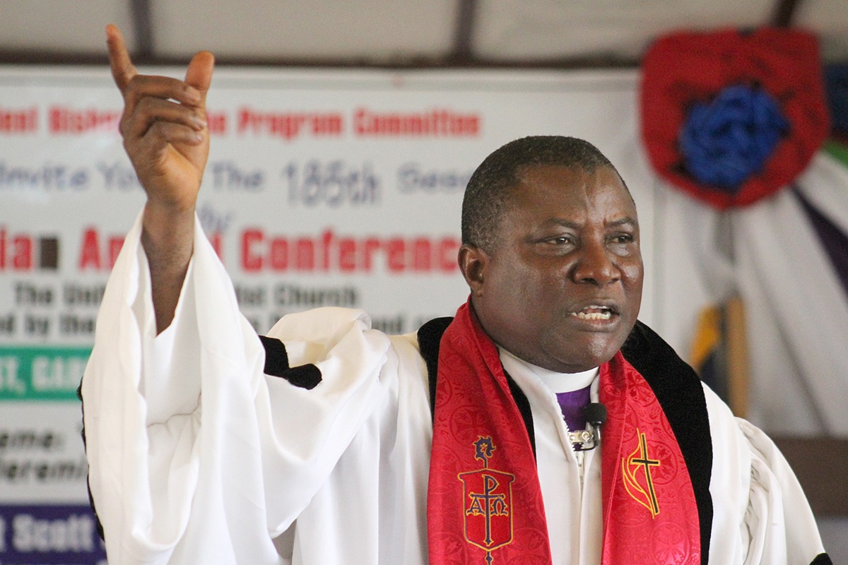 Bishop Samuel J. Quire Jr. preaches the closing sermon during the Liberia Annual Conference meeting in Harper, Maryland County, Liberia, in 2018. Quire said The United Methodist Church in Liberia is ready to welcome home its members living in the United States if they are deported after losing their temporary protection status when it expires March 31. File photo by E Julu Swen, UMNS.