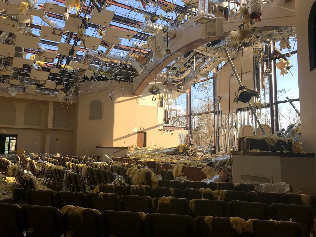 The sanctuary of Lynn Haven United Methodist Church in Panama City, Fla., stands open to the sky following Hurricane Michael in October 2018. A grant from the United Methodist Committee on Relief to the Alabama-West Florida Conference for hurricane recovery is among $27.6 million approved by the relief agency for disaster response, sustainable development, global migration and Global Health support. File photo courtesy of Lynn Haven United Methodist Church.
