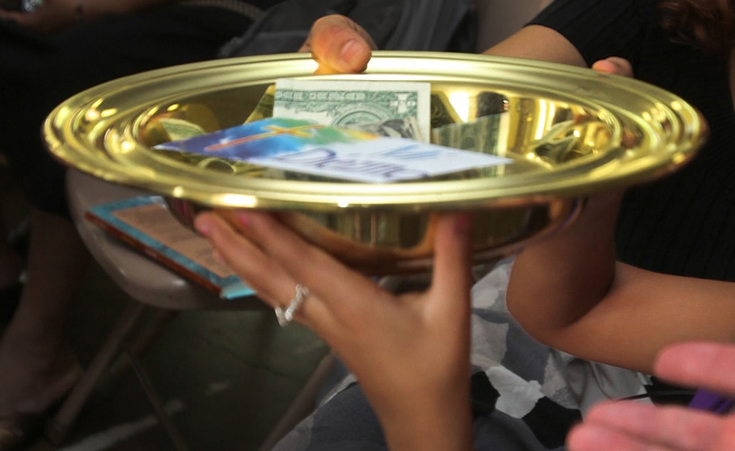 While some plan to withhold church giving, the Desert Southwest Conference asks its churches to continue funding ministry at the conference and global level. Photo illustration by Kathleen Barry, UMNS.