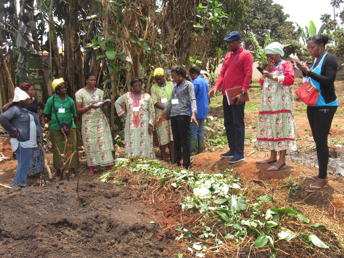 Members of the United Methodist Women Association in Cameroon learn about organic farming during a hands-on session at the group’s annual conference March 11-13 in Yaoundé, Cameroon. Photo by Ebeneza Mosima.