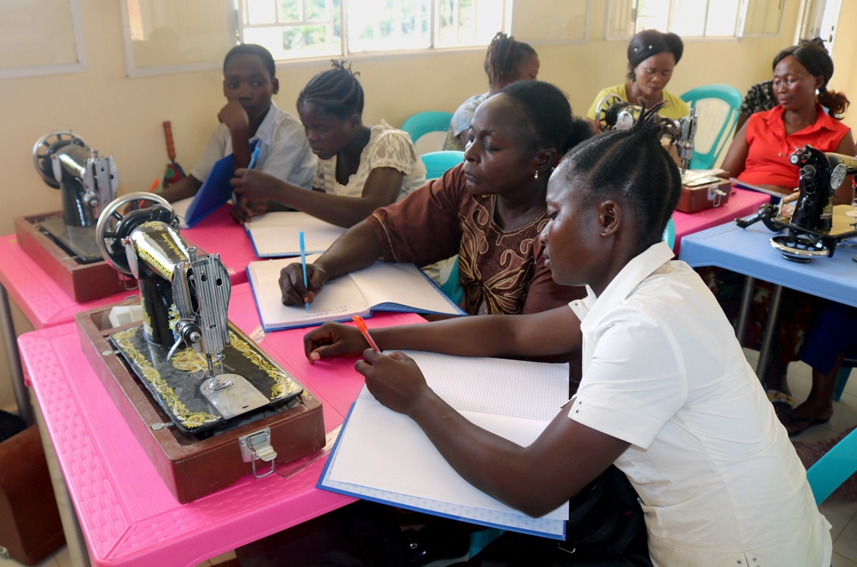 Bibiche Ohanga, right, learns to sew at the Mama Lynn Center, a United Methodist sanctuary for sexual violence survivors in Kindu, Congo. Ohanga received a scholarship from The United Methodist Church to attend the Higher Institute of Nursing Sciences in Kindu. Photo by Judith Osongo Yanga, UMNS.