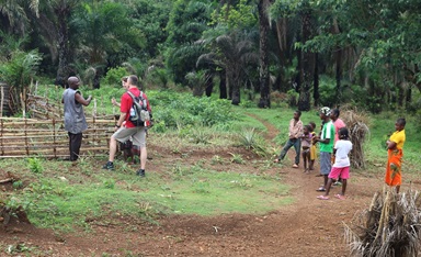 Edwin Joseph Amadu, a United Methodist teacher in the Panguma community in Sierra Leone, shows members of Camp Hill United Methodist Church in Camp Hill, Pennsylvania, how he uses backyard agriculture to augment his income to take care of his family. Photo by Phileas Jusu, UMNS.  Edwin Joseph Amadu, a United Methodist teacher in the Panguma community in Sierra Leone, shows members of Camp Hill United Methodist Church in Camp Hill, Pennsylvania, how he uses backyard agriculture to augment his income to take care of his family. Photo by Phileas Jusu, UMNS.