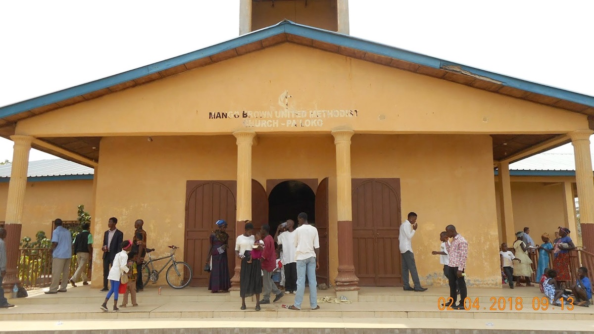 Parishioners gather outside Mango Brown United Methodist Church in the Pa Loko community near Freetown, Sierra Leone, in February 2018. Three members of the church were injured Sunday in a violent attack on their nearby home. File photo by LaDonna Weiler, Faith Church.