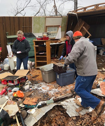 United Methodists in Arkansas salvage personal items from a destroyed home after spring tornados. Photo courtesy of Janice Mann, Arkansas Disaster Response Coordinator.