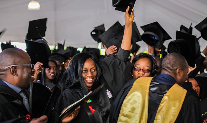 Students and faculty celebrate graduation at Africa University. The school’s vice chancellor,  Munashe Furusa, encouraged the graduates to “go forth and build an Africa that we all want and deserve to live in.” Photo courtesy of Africa University.