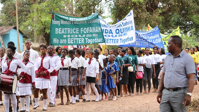 A May 2 march was held during the United Methodist Young Women's 2019 Gathering in Yonibana, Sierra Leone. The colors represent the houses they belong to and each house carries its banner. Photo by Phileas Jusu, UM News.