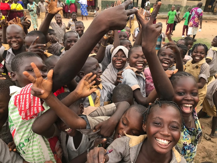 Children at a center for internally displaced persons in Jalingo, Nigeria, greet a group of United Methodist visitors from the United States. Photo by Tim Tanton, UM News.