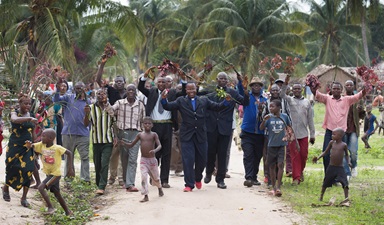 The Rev. Nyenda Okoko (center), a district superintendent, leads a procession of church members as they welcome visitors to Oye United Methodist Church, south of Kindu, Congo, in October 2015. Providing exact membership numbers is difficult in a denomination that spans multiple countries, languages and cultural understandings of church membership. File photo by Mike DuBose, UM News. The Rev. Nyenda Okoko (center), a district superintendent, leads a procession of church members as they welcome visitors to Oye United Methodist Church, south of Kindu, Congo, in October 2015. Providing exact membership numbers is difficult in a denomination that spans multiple countries, languages and cultural understandings of church membership. File photo by Mike DuBose, UM News.