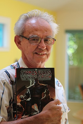 United Methodist deacon Mike Friedrich displays a comic book featuring the Marvel Comics villain Thanos. Friedrich wrote the first stories for the character, created by his roommate Jim Starlin. Photo by Spud Hilton. 