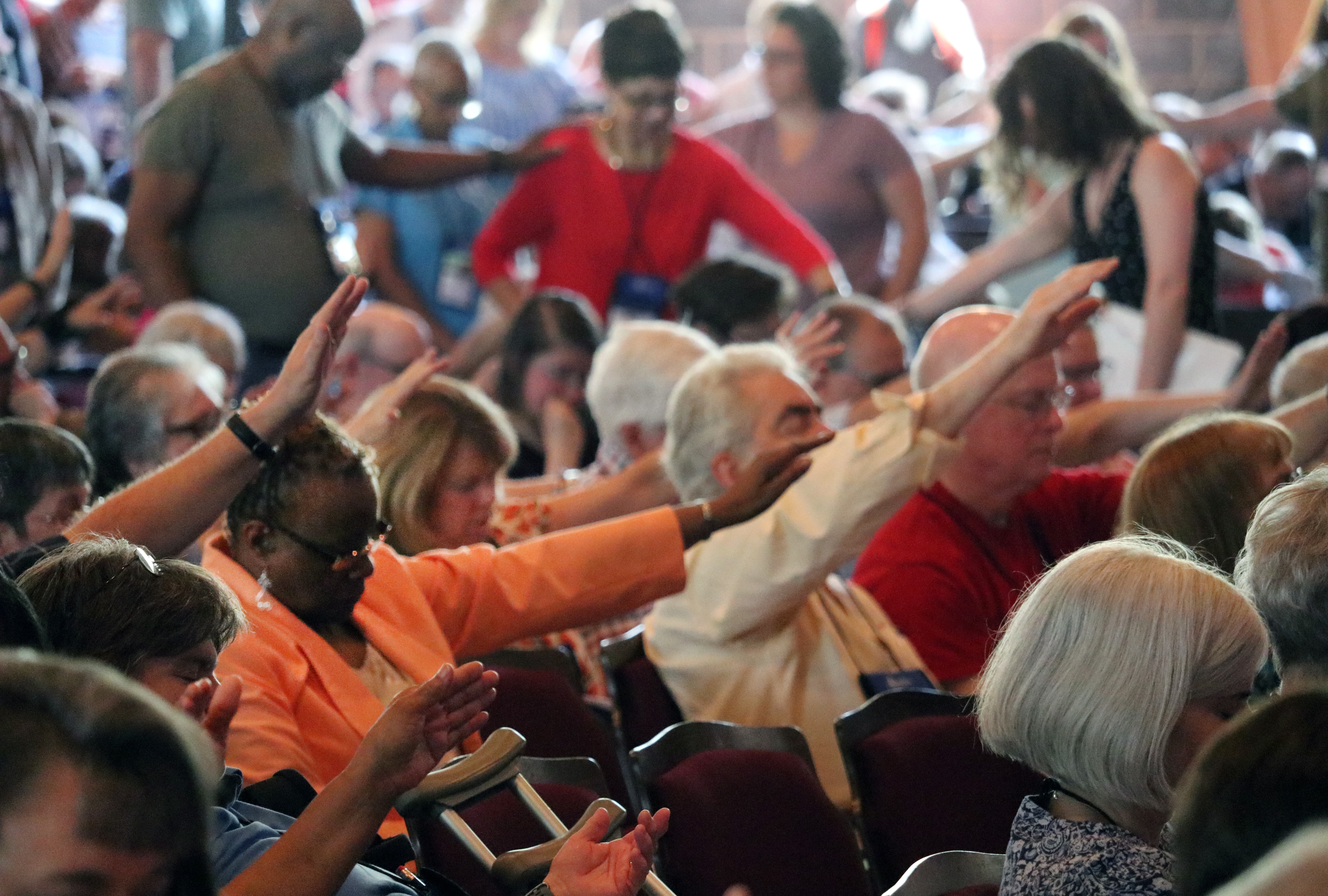 Prayer is part of a morning business meeting during the 2019 East Ohio Annual Conference. Photo by Brett Hetherington, East Ohio Conference. 