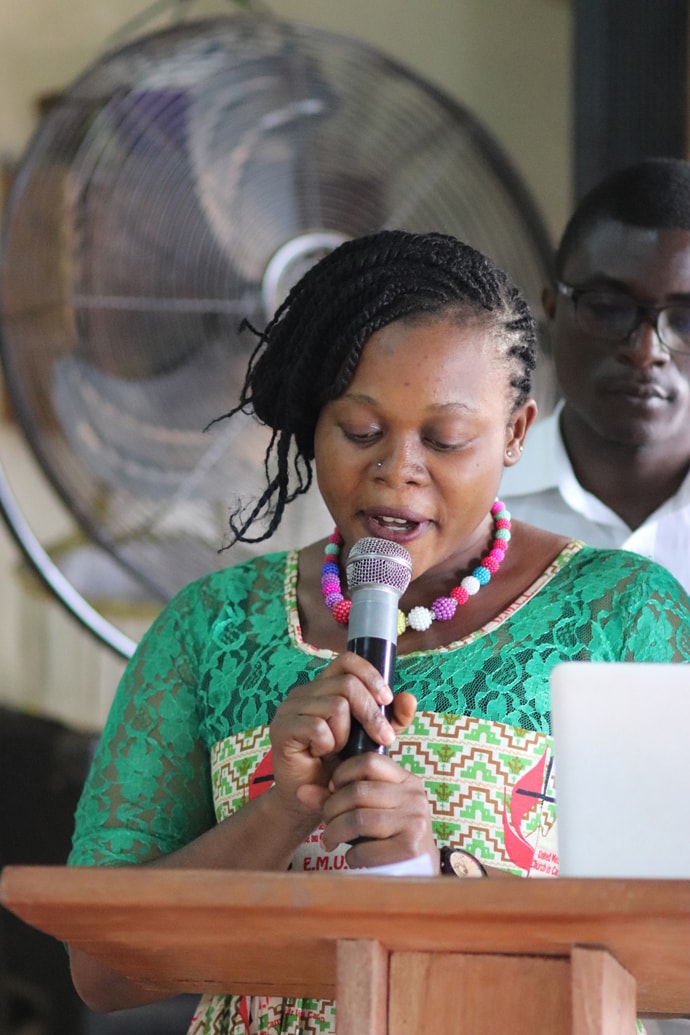 Lisette Che gives a report on the United Methodist Cameroon Mission Initiative. She serves as youth coordinator for the program. Photo by Isaac Broune, UM News.