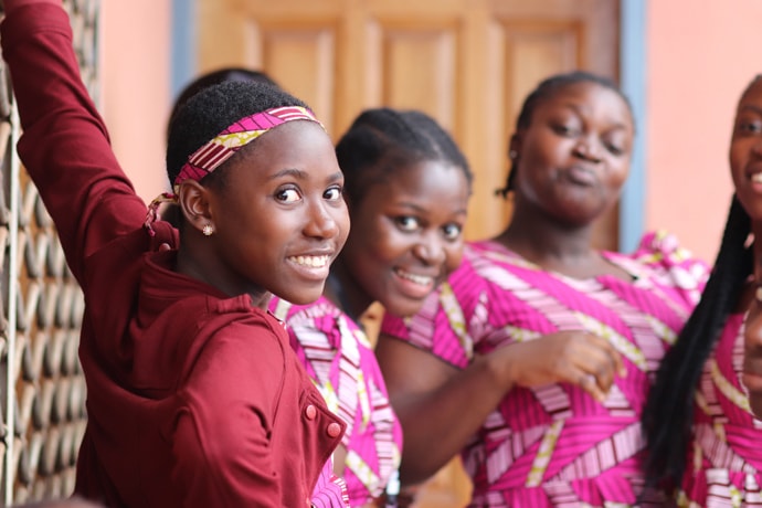 Members of the children’s choir from Blessing United Methodist Church in Yaounde, Cameroon, welcome visitors to the Cameroon Mission Initiative meeting. From left are: Nahomie Diffo, Geneviève Nzie, Larissa Nzie and Falone Diffo. Photo by Isaac Broune, UM News.