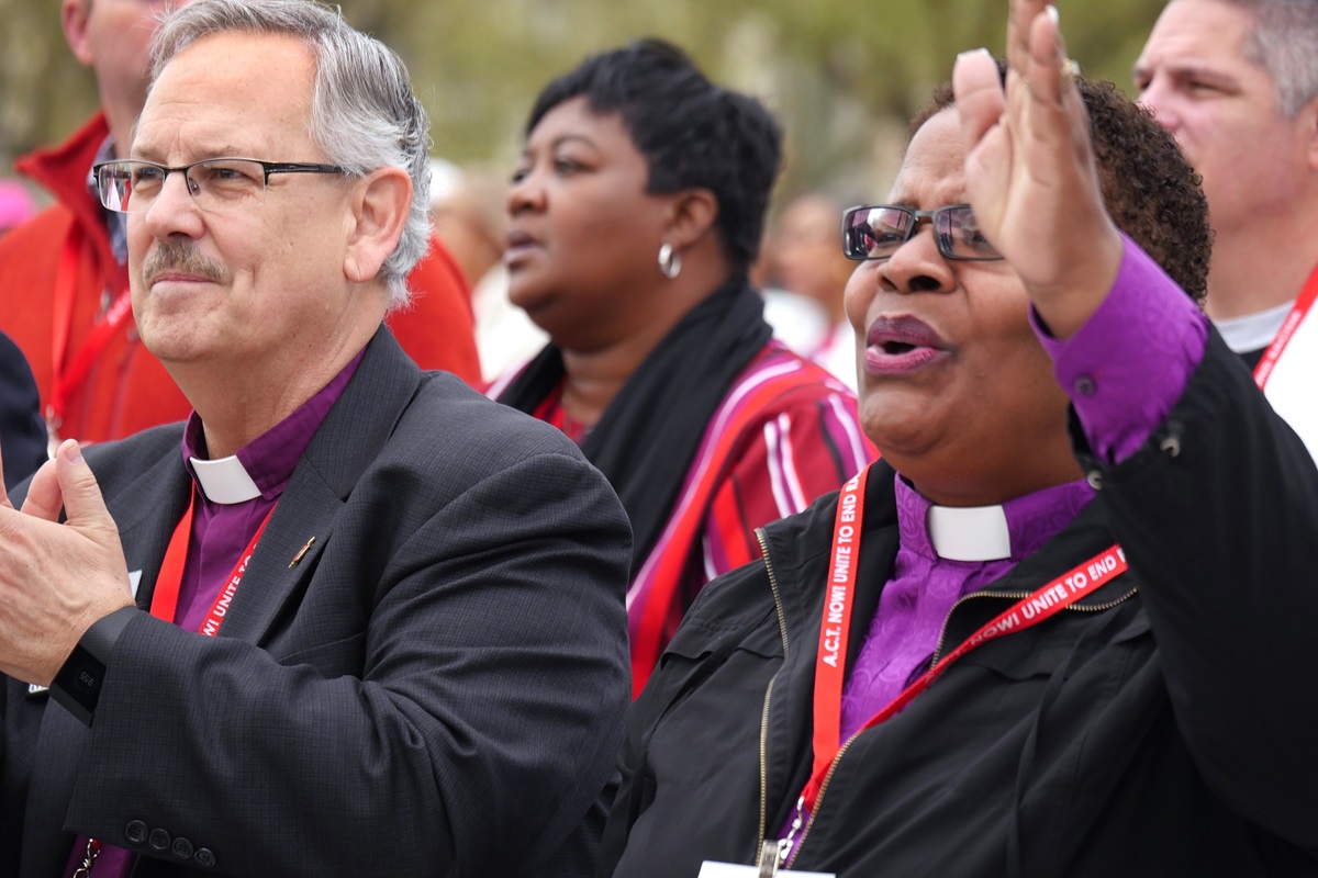 United Methodist Bishops Bruce R. Ough and LaTrelle Easterling stand in solidarity during the national rally to end racism, a Drumbeat for Justice Silent Walk from the Martin Luther King Jr. Memorial to the National Mall on April 4, 2018. Bishop Easterling is among church leaders in Baltimore urging United Methodists to resist “reactionary responses” to President Donald Trump’s tweets disparaging the city. File photo by Kathy L. Gilbert, UMNS.