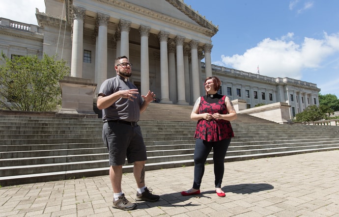 The Revs. Darick Biondi (left) and Cindy Briggs-Biondi are among faith leaders in West Virginia who say the church is called to advocate for mercy and justice. They are standing outside the West Virginia State Capitol in Charleston. Photo by Mike DuBose, UM News.