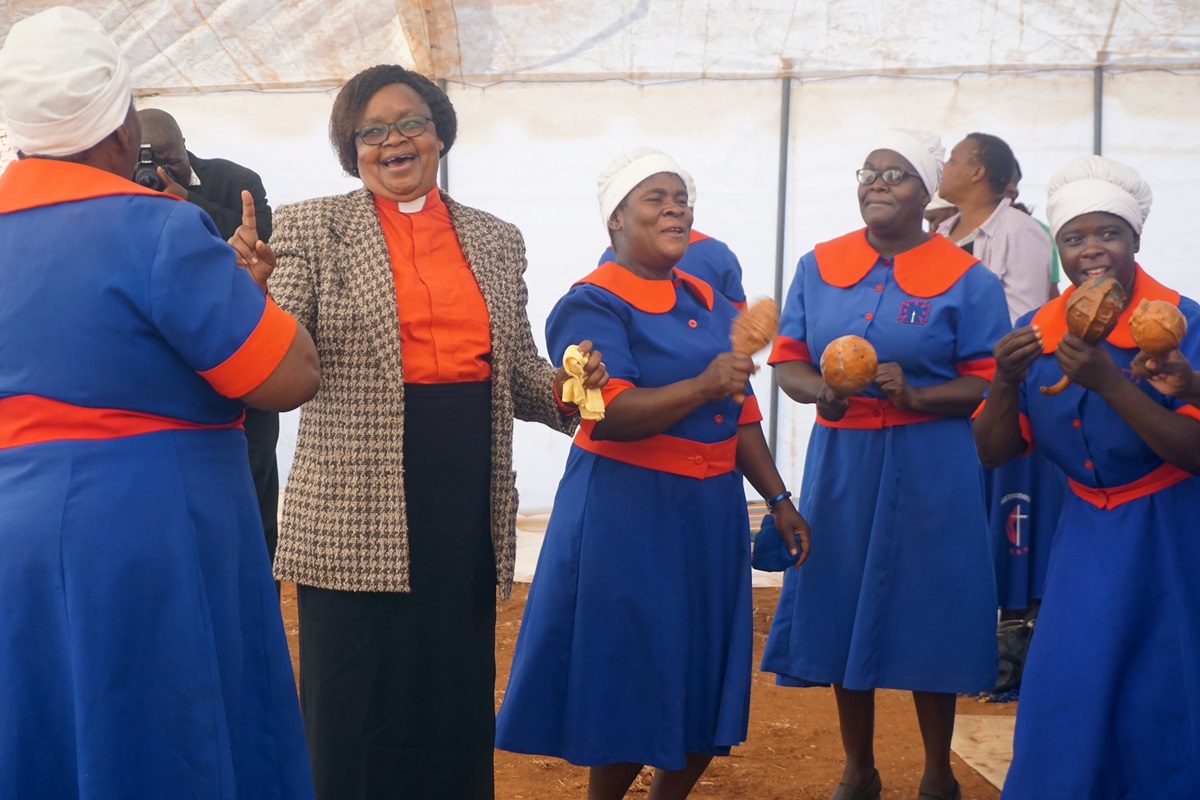 The Rev. Vienna Mutezo (in clerical collar) celebrates an evangelism crusade with United Methodist women in Chiredzi Town, Zimbabwe. Photo by Kudzai Chingwe, UM News.