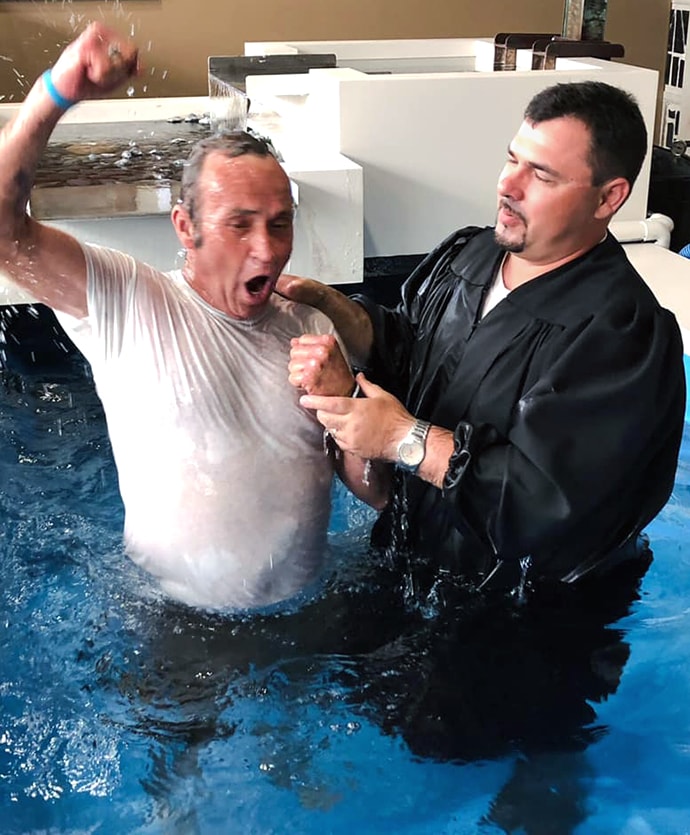 The Rev. Casey Turner baptizes a man trying to overcome addiction at the Breaking Bonds Ministries campus in Jonesboro, Arkansas. Photo courtesy of Breaking Bonds Ministries. 