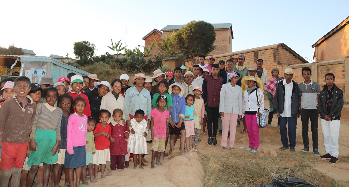 Members of a new United Methodist church community gather in Antsiazopaniry, some 50 kilometers from Antananarivo, the capital of Madagascar. Though only officially a church for a year, United Methodism is taking hold in the island nation. Photo by João Filimone Sambo, UM News.