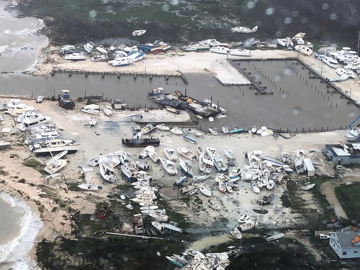 An aerial view shows damage to a marina after Hurricane Dorian pummeled the Bahamas for several days beginning Sept.1. The Coast Guard supported the Bahamian National Emergency Management Agency and the Royal Bahamian Defense Force, who led search and rescue efforts in the Bahamas. Photo by Hunter Medley, U.S. Coast Guard, courtesy of Coast Guard Air Station Clearwater.