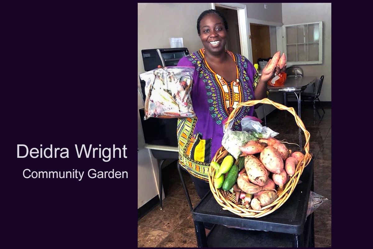 The Rev. Deidra Wright shows off some of the bounty of the community garden at Columbia Drive United Methodist Church, which she founded. Photo courtesy of Columbia Drive United Methodist Church.