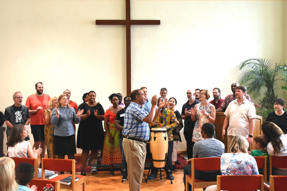 Participants sing during worship at a United Methodist Board of Global Ministries’ pilot project aimed at providing training for pastors and laity who are leading congregations impacted by migration. The session was held Aug. 22-30 at The United Methodist Church of Germany Educational and Training Center in Stuttgart, Germany. Photo by Üllas Tankler, Board of Global Ministries.